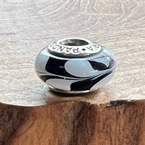 Pandora Retired Black and White Swirl
Murano Glass Charm - 790676 Sterling Core - Picture 6 of 6